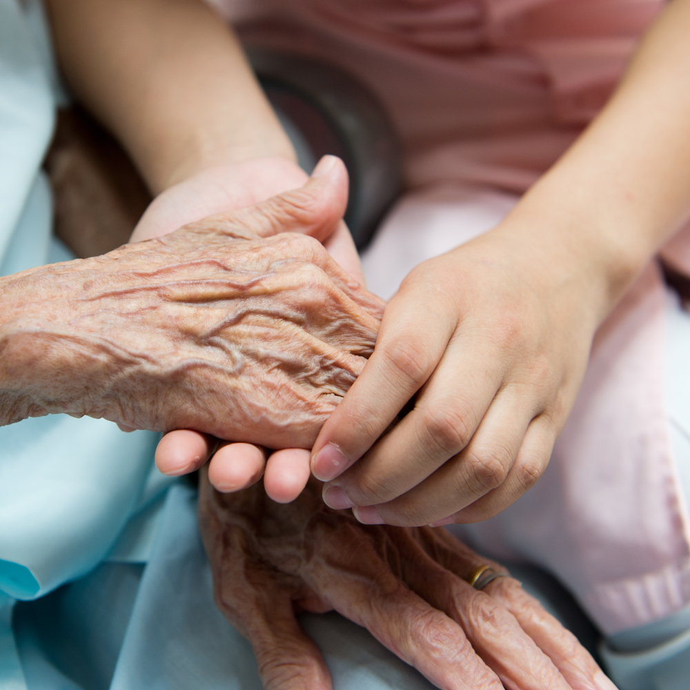 Young and elderly hands